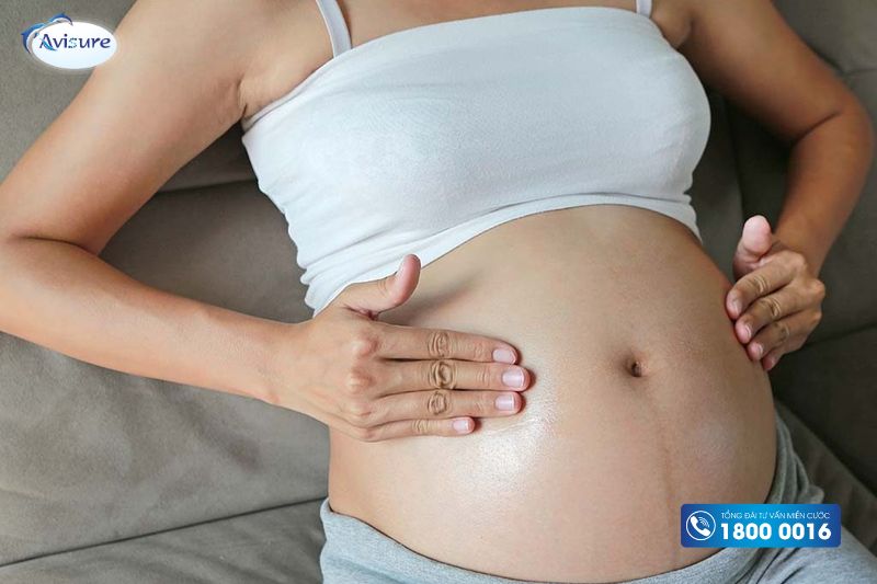 bà bầu đau đẻ massage bụng
